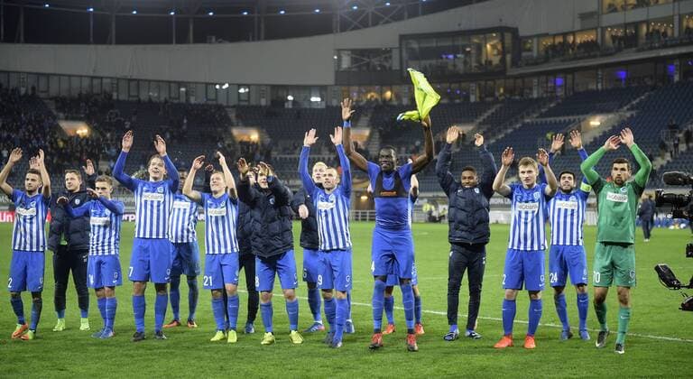 Genk s players celebrate after winning a soccer game between Belgian teams KAA Gent and KRC Genk, Thursday 09 March 2017 in Gent, the first leg of the 1 8 finals of the Europa League competition. YORICKxJANSENS  x05062101x