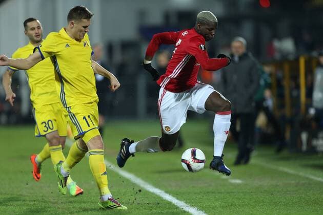 March 9, 2017 - Rostov-On-Don, Russia - Aleksandr Bukharov (L) of FC Rostov and Paul Pogba of FC Manchester United ManU vie for the ball during the UEFA Europa League Round of 16, first leg between FC Manchester United and FC Rostov, at Olimp 2 Stadium in Rostov-on-Don, Russia on March 9, 2017. FK Rostov v Manchester United - UEFA Europa League Round of 16: First Leg  - ZUMAn230 20170309_zaa_n230_247 Copyright: xIgorxRussakx