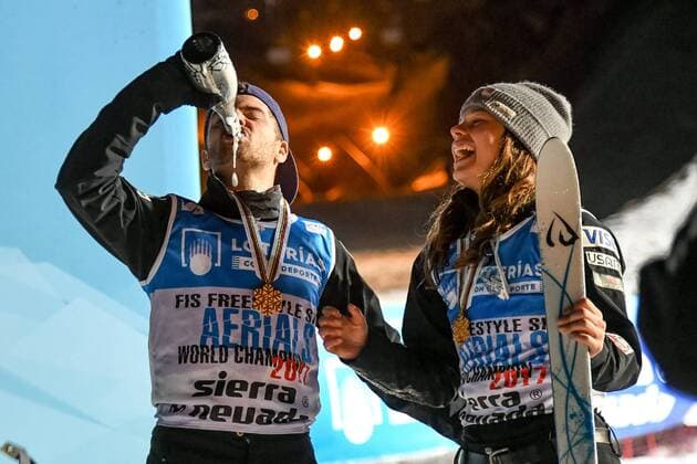 SNOWBOARD, FREESTYLE SKIING - FIS WC 2017 SIERRA NEVADA,SPAIN,10.MAR.17 - SNOWBOARD, FREESTYLE SKIING - FIS Freestyle Ski and Snowboard World Championships, free ski aerials, men ladies final, award ceremony. Image shows the rejoicing of Jonathon Lillis and Ashley Caldwell (USA). Keywords: medal, champagne. GEPAxpictures xOliverxLerch