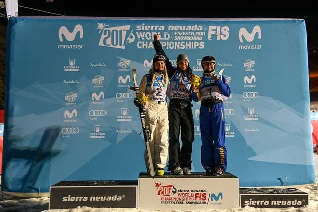 SNOWBOARD, FREESTYLE SKIING - FIS WC 2017 SIERRA NEVADA,SPAIN,10.MAR.17 - SNOWBOARD, FREESTYLE SKIING - FIS Freestyle Ski and Snowboard World Championships, free ski aerials, men ladies final, award ceremony. Image shows the rejoicing of Danielle Scott (AUS), Ashley Caldwell (USA) and Mangtao XU (CHN). GEPAxpictures xOliverxLerch
