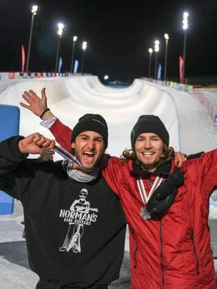 SNOWBOARD, FREESTYLE SKIING - FIS WC 2017 SIERRA NEVADA,SPAIN,11.MAR.17 - SNOWBOARDING - FIS Freestyle Ski and Snowboard World Championships, snowboard halfpipe, finals, men ladies, award ceremony. Image shows the rejoicing of Patrick Burgener and Iouri Podlatchikov (SUI) with their medals. GEPAxpictures xOliverxLerch