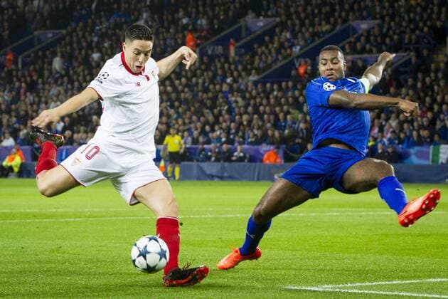 March 14th 2017, King Power Stadium, Leicester, England; UEFA Champions League Football 2nd Leg, Leicester City versus Seville; Wes Morgan of Leicester City lunges to stop a shot from Samir Nasri of Sevilla xGrahamxWilsonx  ActionPlus11856214