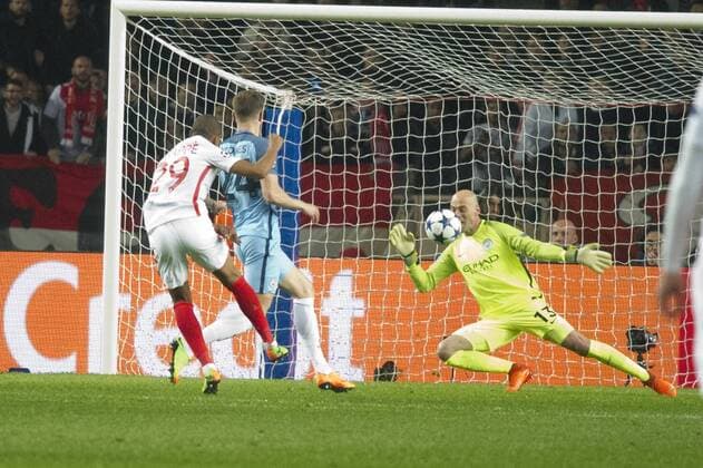 Football - UEFA Champions League - Round of Sixteen: AS Monaco 3 vs. Manchester City 5 Willy Caballero of Manchester City saves a shot from Kylian Mbappe of Monaco, at the Stade Louis II. COLORSPORT WINSTON BYNORTH 