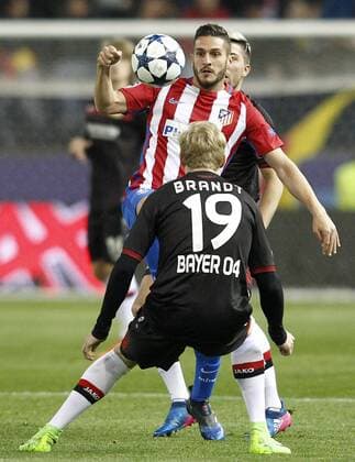 Atletico de Madrid s Koke Resurrecccion (f) and Bayer 04 Leverkusen s Julian Brandt during Champions League 2016 2017 Round of 16 2nd leg match. March 15,2017.  (2017031590)