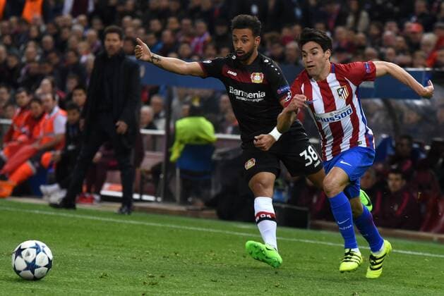 Spain: Atletico de Madrid vs Bayer Leverkusen Nico Gaitán of Atletico de Madrid, right, vies with Karim Bellarabi of Bayer Leverkusen during the UEFA Champions League Round of 16 second leg match between Atletico de Madrid and Bayer 04 Leverkusen at the Vicente Calderón stadium in Madrid.  JorgexSanzx xPacificxPress