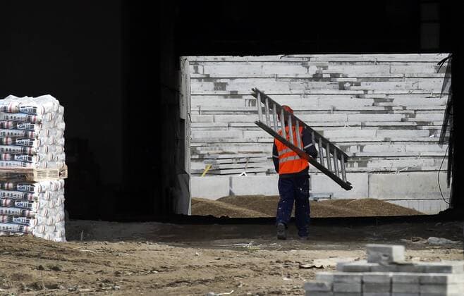 ROSTOV-ON-DON, RUSSIA - MARCH 16, 2017: A worker at the construction site of Rostov Arena Stadium, a venue for 2018 FIFA World Cup WM Weltmeisterschaft Fussball matches. Valery Matytsin TASS  TS0447BB