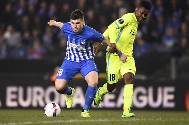 Genk s Ruslan Malinovsky and Gent s Samuel Kalu fight for the ball during the return game of 1 8 finals of the Europa League competition between Belgian soccer team KRC Genk and Belgian club KAA Gent, Thursday 16 March 2017, in Genk. First leg in Gent ended on a 2-5 result. YORICKxJANSENS  x05065780x