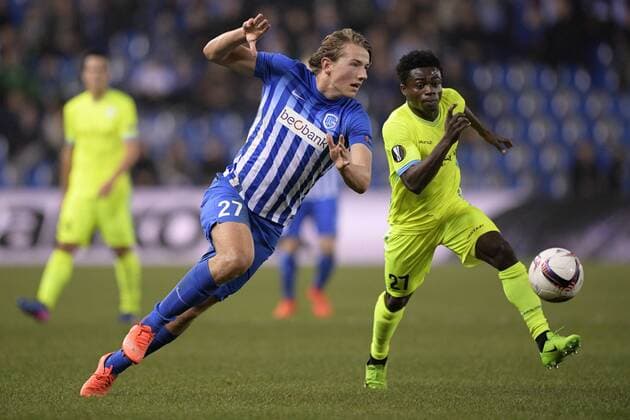 Genk s Sander Berge and Gent s Moses Simon fight for the ball during the return game of 1 8 finals of the Europa League competition between Belgian soccer team KRC Genk and Belgian club KAA Gent, Thursday 16 March 2017, in Genk. First leg in Gent ended on a 2-5 result. YORICKxJANSENS  x05065815x
