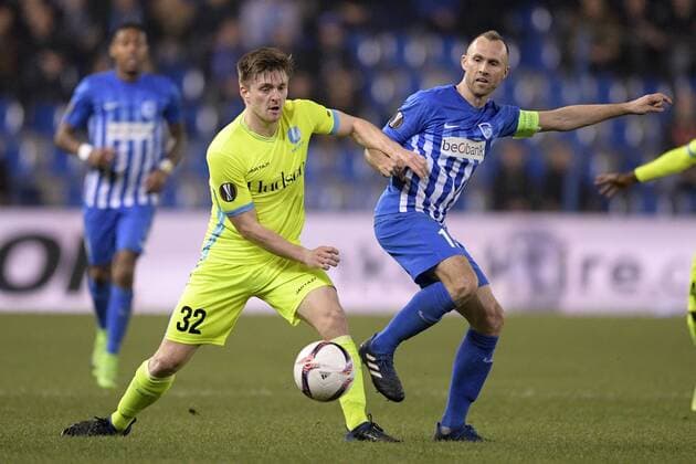 Gent s Thomas Foket and Genk s Thomas Buffel fight for the ball during the return game of 1 8 finals of the Europa League competition between Belgian soccer team KRC Genk and Belgian club KAA Gent, Thursday 16 March 2017, in Genk. First leg in Gent ended on a 2-5 result. YORICKxJANSENS  x05065827x