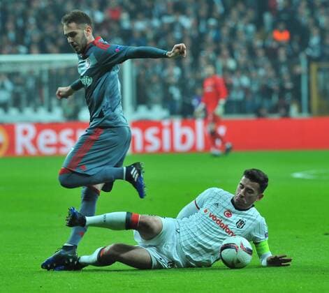 Besiktas OÄüuzhan Özyakup and Olympiakos .... during a Europa League round of 16 second leg soccer match at Vodafone Arena stadium in Istanbul, Thursday, March 16, 2017.(Tolga Adanali - Depo Photos)  15650099