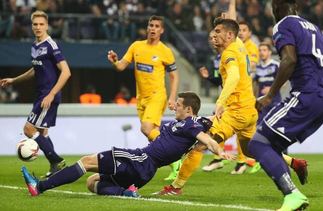 Anderlecht s Uros Spajic and Apoel s Kostakis Artymatas fight for the ball during a return 1 8 final game of the Europa League competition between Belgian soccer team RSC Anderlecht and Cyprus team Apoel Nicosie in Anderlecht, Thursday 16 March 2017. First leg in Nicosie ended on a 0-1 result. VIRGINIExLEFOUR  x05065968x