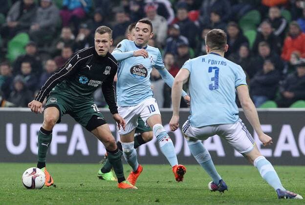 KRASNODAR, RUSSIA - MARCH 16, 2017: FC Krasnodarâ€™s Viktor Claesson, Celta de Vigoâ€™s Iago Aspas, Andreu Fontas (L-R) fight for the ball in their 2016-17 UEFA Europa League Round of 16 Leg 2 football match at Krasnodar Stadium. Celta de Vigo won the game 2-0. Vitaly Timkiv TASS  TS044890