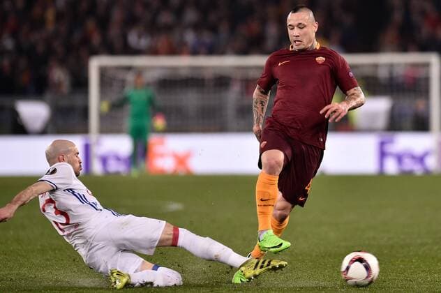 Christophe Jallet of Olympique Lyonnais challenges Radja Nainggolan of AS Roma during the UEFA Europa League match between Roma and Olympique Lyonnais at Stadio Olimpico, Rome, Italy on 16 March 2017. Copyright: xGiuseppexMaffiax 14640014