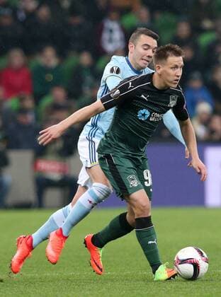 KRASNODAR, RUSSIA - MARCH 16, 2017: Celta de Vigoâ€™s Iago Aspas (L) and FC Krasnodarâ€™s Sergei Petrov fight for the ball in their 2016-17 UEFA Europa League Round of 16 Leg 2 football match at Krasnodar Stadium. Celta de Vigo won the game 2-0. Vitaly Timkiv TASS  TS0448A0
