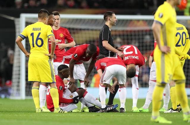 Football - 2016 2017 Europa Cup - Round 16, 2nd leg - Manchester United ManU vs FC Rostov Paul Pogba of Manchester United goes off injured during the match at Old Trafford. 
