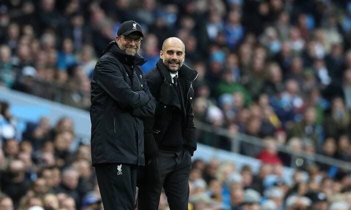 Manchester City Manager Pep Guardiola and Jurgen Klopp manager of Liverpool during the English Premier League match at The Etihad Stadium, Manchester . Picture date: March 19th 2017. Pic credit should read: Lynne Cameron Sportimage EDITORIAL USE ONLY. No use with unauthorised audio, video, data, fixture lists, club league logos or live services. Online in-match use limited to 120 images, no video emulation. No use in betting, games or single club league player publications.