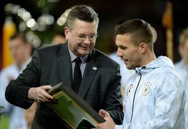 22.03.2017, xfux, Fussball Freundschaftsspiel, Deutschland - England, emspor, v.l. Prasident Reinhard Grindel (DFB Deutscher Fussball-Bund), Lukas Podolski (Deutsche Fussball Nationalmannschaft DFB) Dortmund