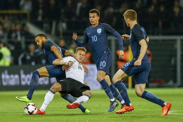 (l-r) Ryan Bertrand of England, Joshua Kimmich of Germany, Dele Alli of Englandduring the friendly match between Germany and England on March 22, 2017 at the Signal Iduna Park stadium in Dortmund, Germany. Germany v England Friendly match 2016 2017 xVIxxIVx 7401239