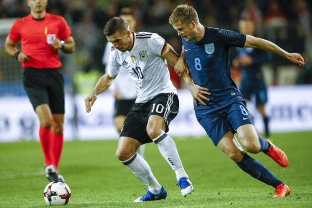 (l-r) Lukas Podolski of Germany, Eric Dier of Englandduring the friendly match between Germany and England on March 22, 2017 at the Signal Iduna Park stadium in Dortmund, Germany. Germany v England Friendly match 2016 2017 xVIxxIVx 7401312