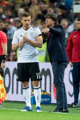 Dortmund, Germany 22.03.2017, Laenderspiel, Deutschland - England, Lukas Podolski (GER) und Bundestrainer Joachim Loew (GER) gestikuliert ( DeFodi001