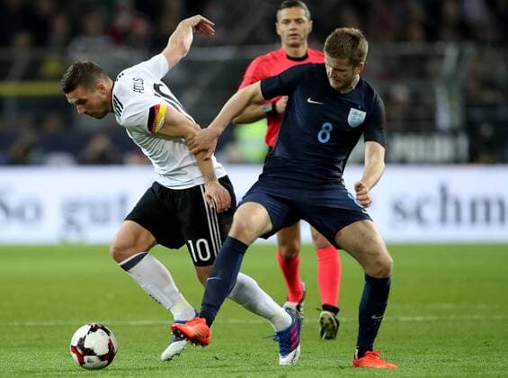 Deutschland, Dortmund, Signal Iduna Park, 22.03.2017, Fussball - Laenderspiel - Deutschland - England Bild: v. lk. Lukas Podolski (Deutschland, 10) und Eric Dier (England, 8) Copyright: HMBxMedia xHeikoxBecker