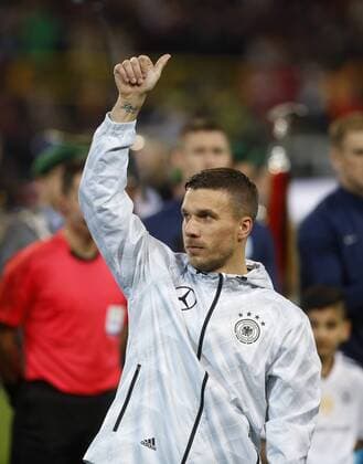 Germanys Lukas Podolski thumps up during the friendly match between Germany vs. England , Signal Iduna Park in Dortmund on March 22., 2017. Länderspiel zwischen Deutschland vs. England am 22. März 2017.