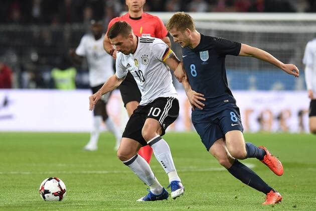 Fußball Länderspiel Deutschland - England am 22.03.2017 im Signal Iduna Park in Dortmund Lukas Podolski ( Deutschland ), links - Eric Dier ( England ), rechts xRx
