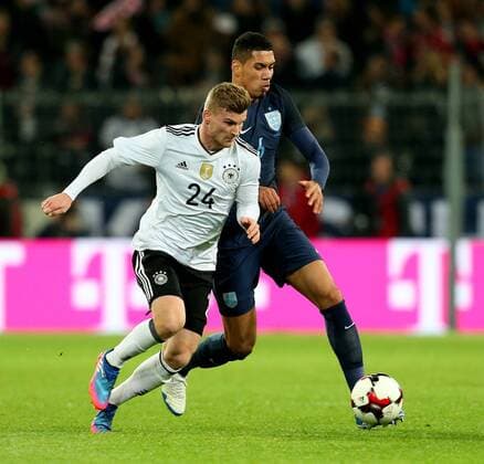 Timo Werner of Germany takes on Chris Smalling of England during the International Friendly Länderspiel at Signal Iduna Park, Dortmund. Picture date: March 22nd, 2017. Pic credit should read: Matt McNulty Sportimage EDITORIAL USE ONLY. No use with unauthorised audio, video, data, fixture lists, club league logos or live services. Online in-match use limited to 120 images, no video emulation. No use in betting, games or single club league player publications.