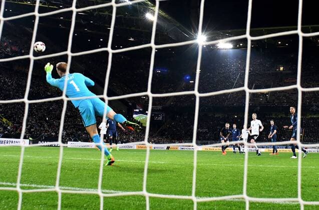 22.03.2017, xfux, Fussball Freundschaftsspiel, Deutschland - England, emspor, v.l. Joe Hart (England), Lukas Podolski (Deutsche Fussball Nationalmannschaft DFB) Goal scored, Tor zum 1:0 Dortmund