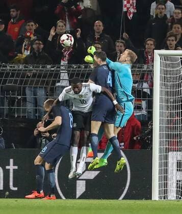 (170323) -- DORTMUND, March 23, 2017 -- England s goalkeeper Joe Hart, England s Michael Keane, Germany s Antonio Ruediger and England s Eric Dier (R to L) vie for the ball during an International Friendly Länderspiel match between Germany and England in Dortmund, Germany, on March 22, 2017. Germany won 1-0 and Germany s Lukas Podolski retired from German national team Nationalteam after this match. ) (SP)GERMANY-DORTMUND-SOCCER-FRIENDLY-GERMANY VS ENGLAND ShanxYuqi 