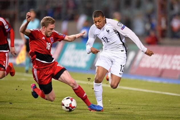 12 Kylian MBAPPE (fra) - 18 Laurent Jans (lux) FOOTBALL : Luxembourg vs France - Qualifications Coupe du Monde 2018 - 25 03 2017 AnthonyBIBARD FEP Panoramic 