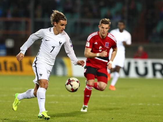 (170326) -- LUXEMBOURG, March 26, 2017 -- Antoine Griezmann (L) of France competes during the FIFA World Cup WM Weltmeisterschaft Fussball 2018 qualifying football match between France and Luxembourg in Luxembourg, March 25, 2017. ) (SP)LUXEMBOURG-FOOTBALL-WORLD CUP-QUALIFYING GongxBing 