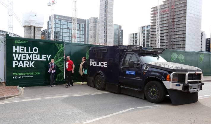 England s fans go past a police van during the World Cup Qualifying match at Wembley Stadium, London. Picture date: March 26th, 2017. Pic credit should read: David Klein Sportimage EDITORIAL USE ONLY. No use with unauthorised audio, video, data, fixture lists, club league logos or live services. Online in-match use limited to 120 images, no video emulation. No use in betting, games or single club league player publications.