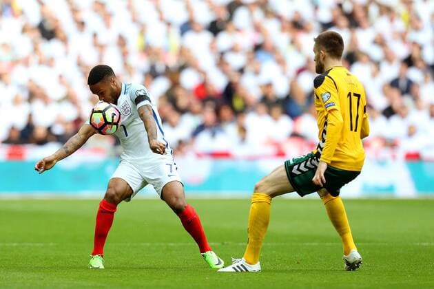 Raheem Sterling of England and Michele Rizzo of Lithuania during the Group F World Cup Qualifier at Wembley Stadium, London. Picture date: March 26th, 2017. Pic credit should read: Matt McNulty Sportimage EDITORIAL USE ONLY. No use with unauthorised audio, video, data, fixture lists, club league logos or live services. Online in-match use limited to 120 images, no video emulation. No use in betting, games or single club league player publications.