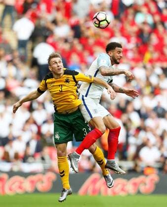 Lorenzo Cittadini of Lithuania challenges Kyle Walker of England during the Group F World Cup Qualifier at Wembley Stadium, London. Picture date: March 26th, 2017. Pic credit should read: Matt McNulty Sportimage EDITORIAL USE ONLY. No use with unauthorised audio, video, data, fixture lists, club league logos or live services. Online in-match use limited to 120 images, no video emulation. No use in betting, games or single club league player publications.