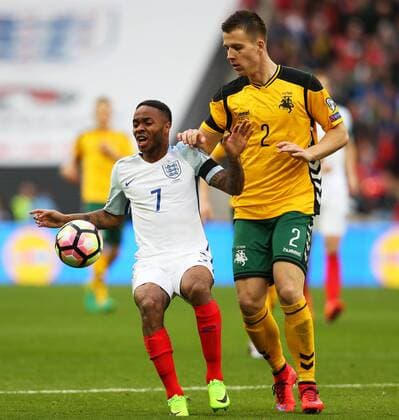 Raheem Sterling of England and Ornel Gega of Lithuania during the Group F World Cup Qualifier at Wembley Stadium, London. Picture date: March 26th, 2017. Pic credit should read: Matt McNulty Sportimage EDITORIAL USE ONLY. No use with unauthorised audio, video, data, fixture lists, club league logos or live services. Online in-match use limited to 120 images, no video emulation. No use in betting, games or single club league player publications.