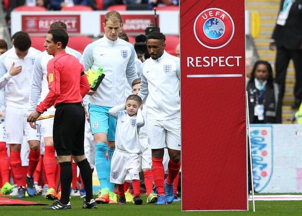 March 26th 2017, Wembley Stadium, London, England; World Cup 2018 Qualification football, England versus Lithuania; Jermain Defoe of England leads out Bradley Lowery as the England team leave the tunnel to the pitch before kick off xJohnxPatrickxFletcherx  ActionPlus11860854