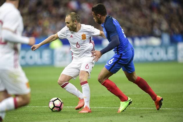 Corentin Tolisso (France) vs Andres Iniesta (Espagne) FOOTBALL : France vs Espagne - Match Amical- St Denis - 28 03 2017 JBAutissier Panoramic 