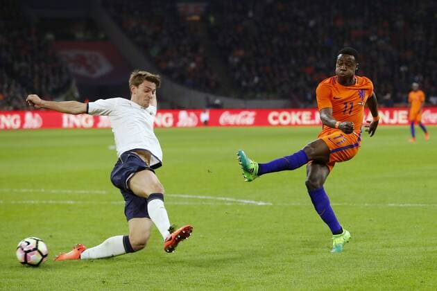 (L-R) Daniele Rugani of Italy, Quincy Promes of Hollandduring the friendly match between Netherlands and Italy at the Amsterdam Arena on March 28, 2017 in Amsterdam, The Netherlands Netherlands v Italy Friendly match 2016 2017 xVIxxIVx 7447444