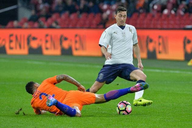 March 28, 2017 - Amsterdam, Netherlands - Kenny Tete from the Netherlands tackles Matteo Darmian from Italy during the friendly match between Netherlands and Italy on March 28, 2017 at the Amsterdam ArenA in Amsterdam, Netherlands. Netherlands v Italy - International Friendly Länderspiel  - ZUMAn230 20170328_zaa_n230_292 Copyright: xAndyxAstfalckx