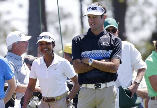 Former United States Secretary of State Condoleezza Rice and Bubba Watson watch Jordan Spieth hit a tee shot while playing a practice round at the 2017 Masters Tournament at Augusta National Golf Club in Augusta, Georgia on April 2, 2017.  AUG20170402126 JOHNxANGELILLO