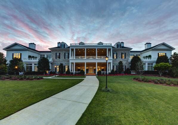 The sun rises behind the new Press Building at Augusta National Golf Club. The new facility boasts a state of the art Working Arena and Interview Room, expanded suites for television, radio and photographers, new gentlemen and ladies locker rooms and a full-service restaurant.  AUG20170402143 MILLERxBROWN