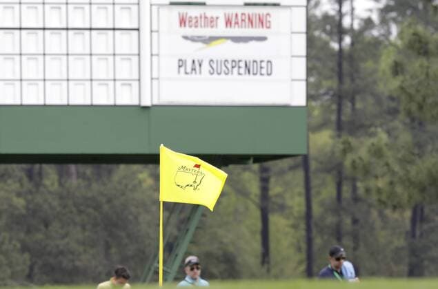 Patrons exit the grounds after play is suspended for the day due to an incoming storm on Monday s practice rounds at the 2017 Masters Tournament at Augusta National Golf Club in Augusta, Georgia on April 3, 2017. Play was suspended at 2:30 PM for the day based on a new weather forecast.  AUG20170403103 JOHNxANGELILLO