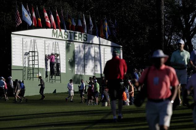 Patrons walk on the golf course in the morning for a practice round on Tuesday at the 2017 Masters Tournament at Augusta National Golf Club in Augusta, Georgia on April 4, 2017.  AUG20170404139 JOHNxANGELILLO