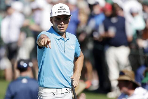 Rickie Fowler points at a practice round on Tuesday at the 2017 Masters Tournament at Augusta National Golf Club in Augusta, Georgia on April 4, 2017.  AUG20170404106 JOHNxANGELILLO