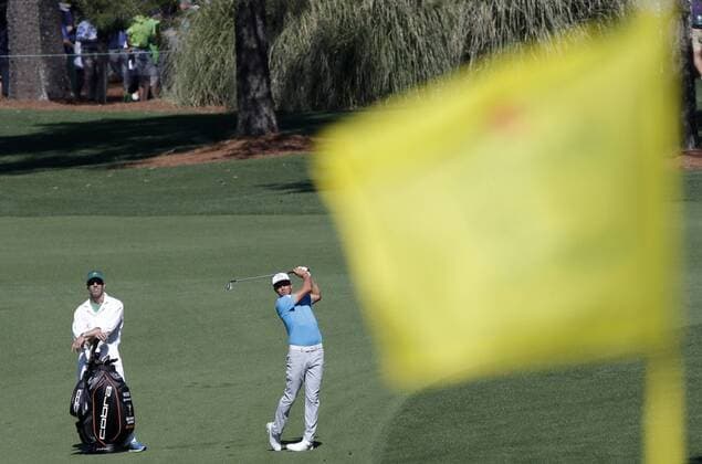 Rickie Fowler hits an approcah shot at a practice round on Tuesday at the 2017 Masters Tournament at Augusta National Golf Club in Augusta, Georgia on April 4, 2017.  AUG20170404108 JOHNxANGELILLO