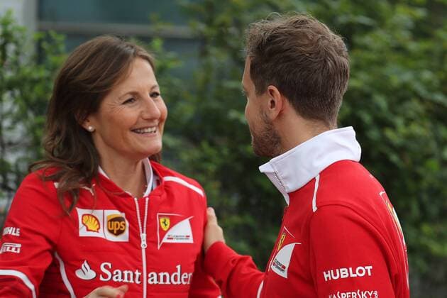 Chinese Grand Prix, Shanghai 06 - 09 April 2017 06.04.2017 - Stefania Boccoli (ITA) Ferrari PR Officer and Sebastian Vettel (GER) Scuderia Ferrari SF70H 