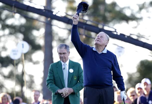 Chairman of Augusta National Golf club Billy Payne bows his head as Jack Nicklaus looks up and tips his cap before he hits a ceremonial first tee ball honoring the late Arnold Palmer before the first round begins at the 2017 Masters Tournament at Augusta National Golf Club in Augusta, Georgia on April 6, 2017.  AUG20170406605 JOHNxANGELILLO