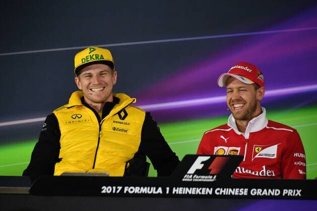 German F1 driver Nico Hulkenberg of Renault, left, and German Formula One driver Sebastian Vettel of Scuderia Ferrari attend a press conference PK Pressekonferenz ahead of the 2017 Formula One Chinese Grand Prix at the Shanghai International Circuit in Shanghai, China, 6 April 2017. F1 drivers attend press conference for 2017 Formula One Chinese Grand Prix  20170406_09173