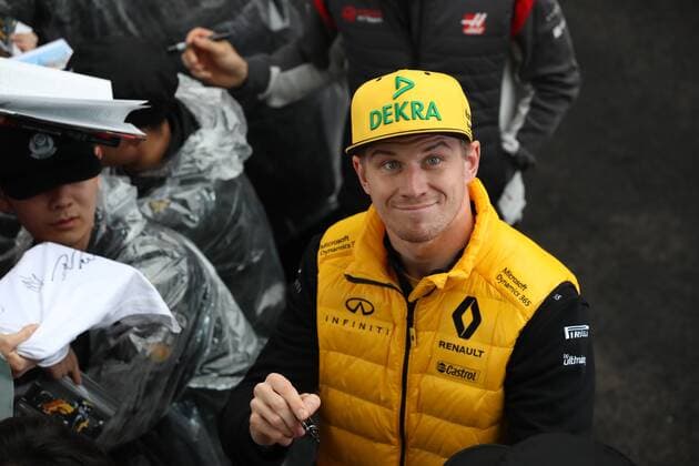 German F1 driver Nico Hulkenberg of Renault signs autographs for fans at the Shanghai International Circuit before the 2017 Formula One Chinese Grand Prix at the Shanghai International Circuit in Shanghai, China, 6 April 2017. F1 drivers wow fans with signatures and selfies in Shanghai  20170406_62805